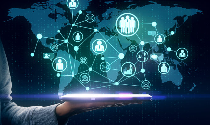 hand-holding-tablet-with-glowing-social-network-ma-2026-01-11-08-36-11-utc