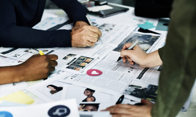 Startup Business People Working Checking Newspaper Information